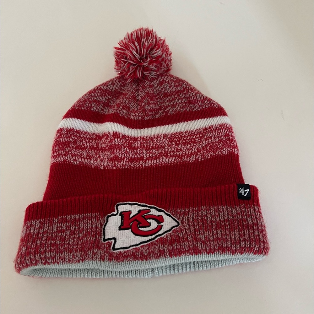 Cuffed knit hat with Pom